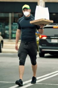 Kellan Lutz in a Yellow Cap