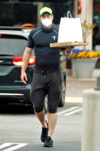 Kellan Lutz in a Yellow Cap