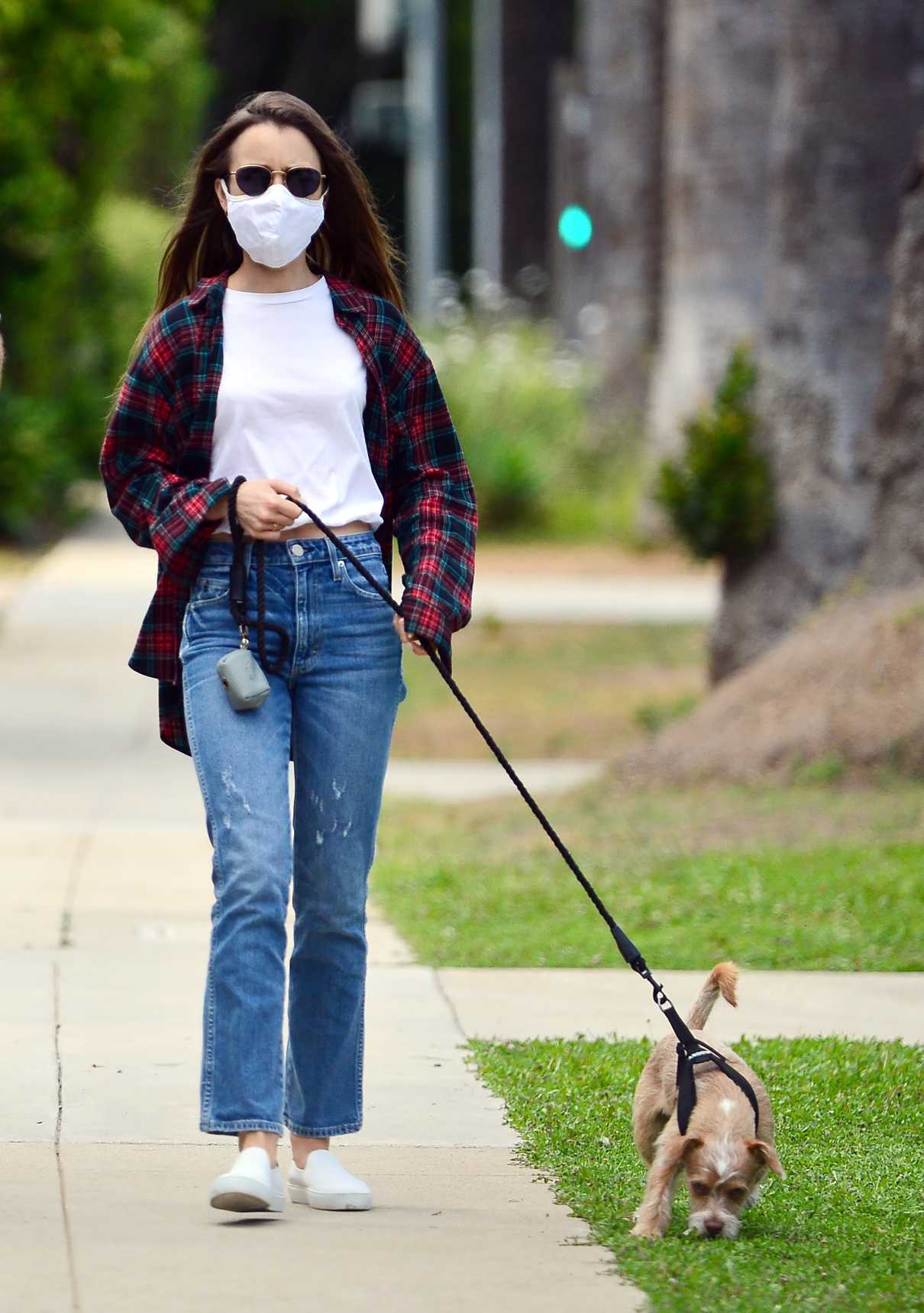 Lily Collins in a Protective Mask