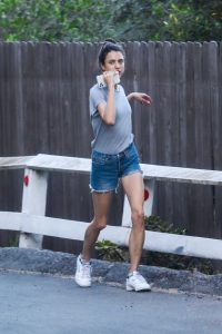 Margaret Qualley in a Gray Tee