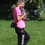 Michelle Hunziker in a Pink Tee Walks Her Dog in the Public Park in Bergamo 05/10/2020