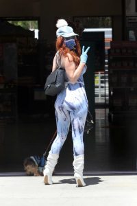 Phoebe Price in a Protective Mask