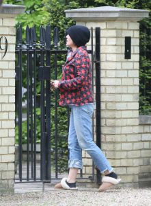 Sadie Frost in a Black Knit Hat