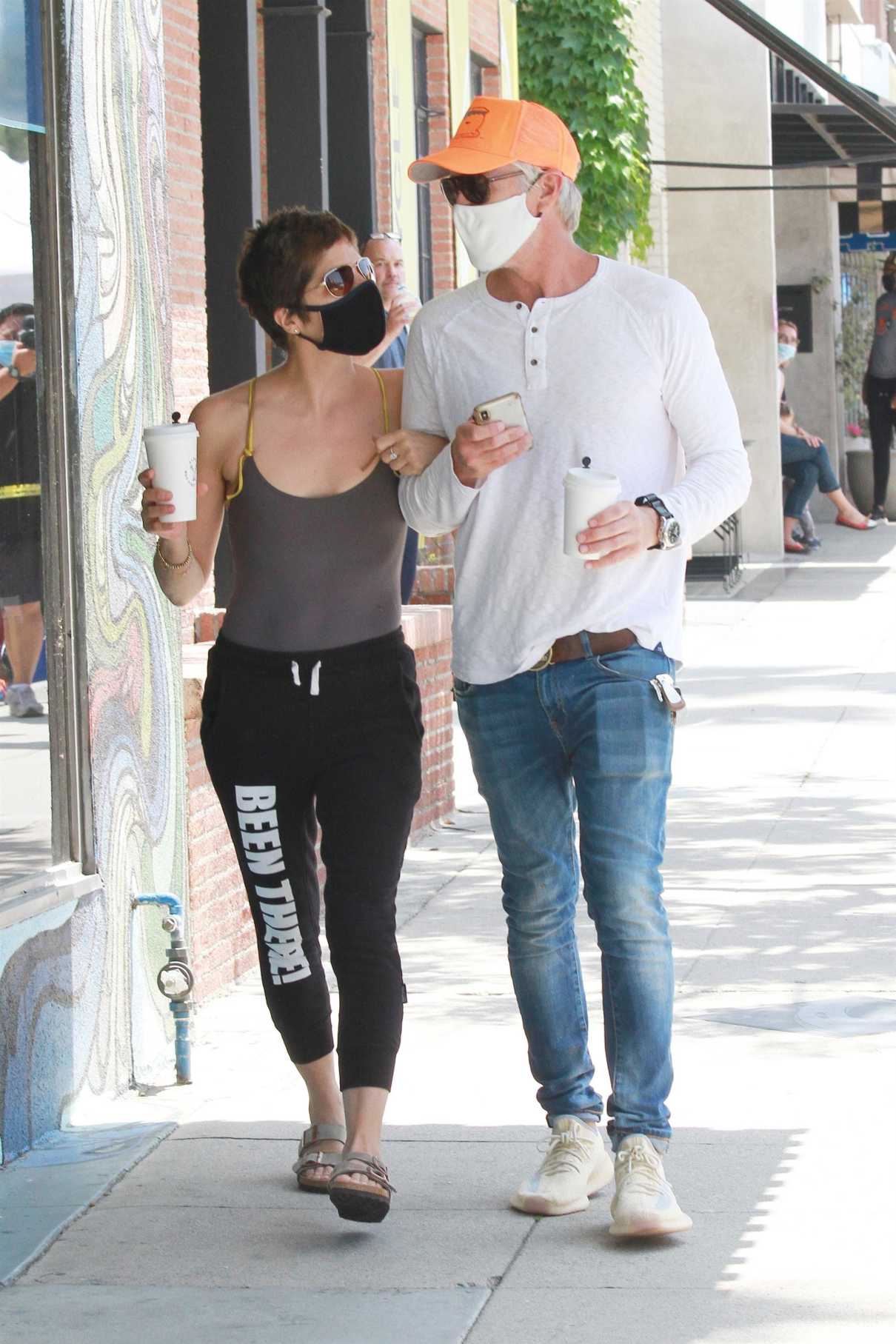 Selma Blair in a Black Protective Mask