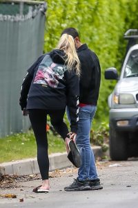 Sophie Turner in a Black Leggings