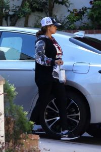 Stacey Dash in a Black Sneakers
