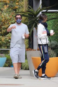 Adam Sandler in a Protective Mask