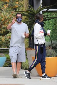 Adam Sandler in a Protective Mask