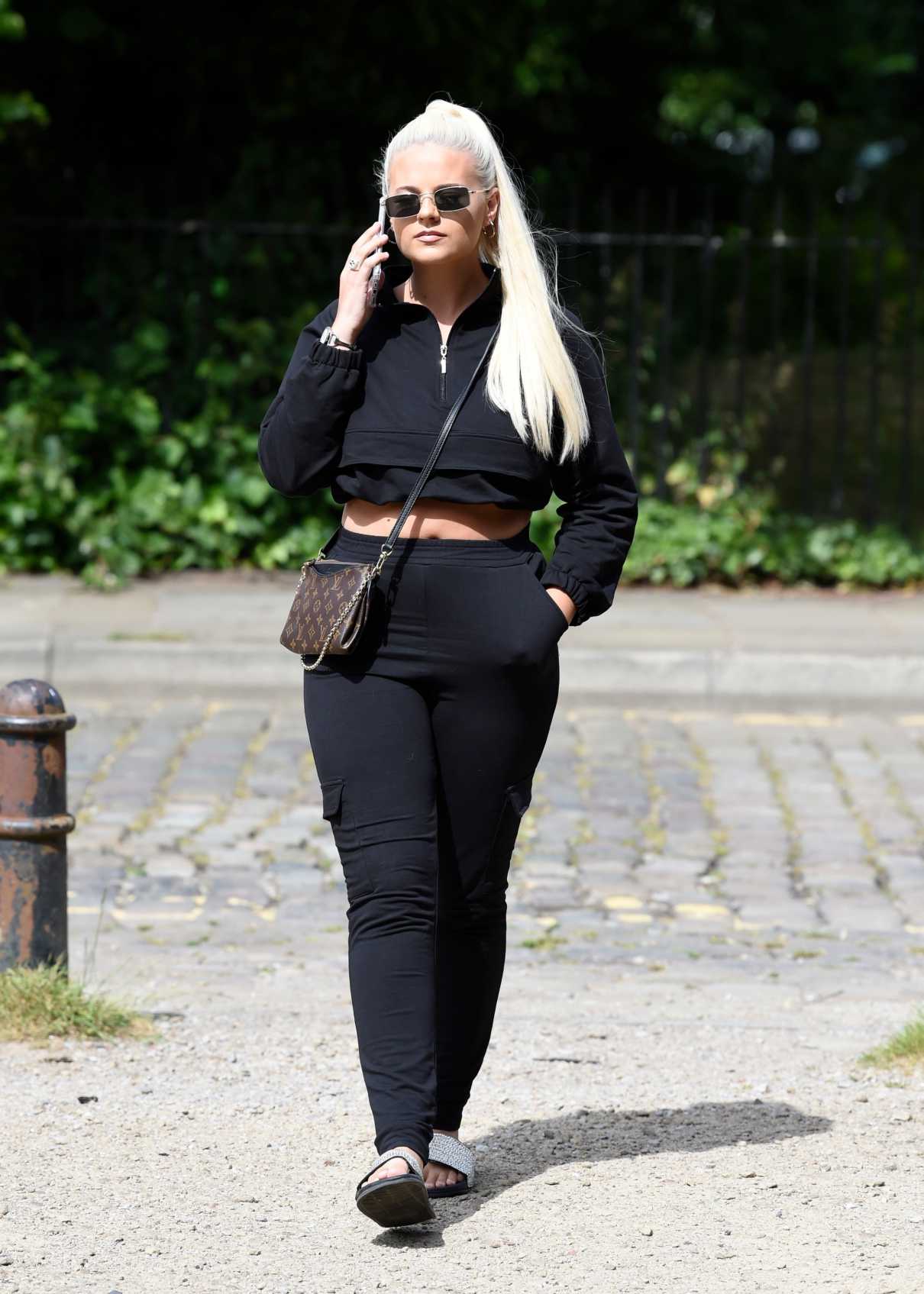 Apollonia Llewellyn in a Black Tracksuit