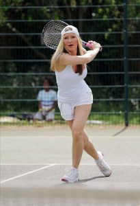 Caprice Bourret in a White Tank Top