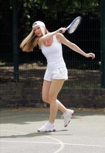 Caprice Bourret in a White Tank Top