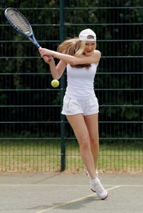 Caprice Bourret in a White Tank Top