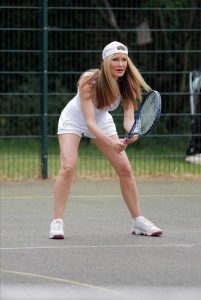 Caprice Bourret in a White Tank Top