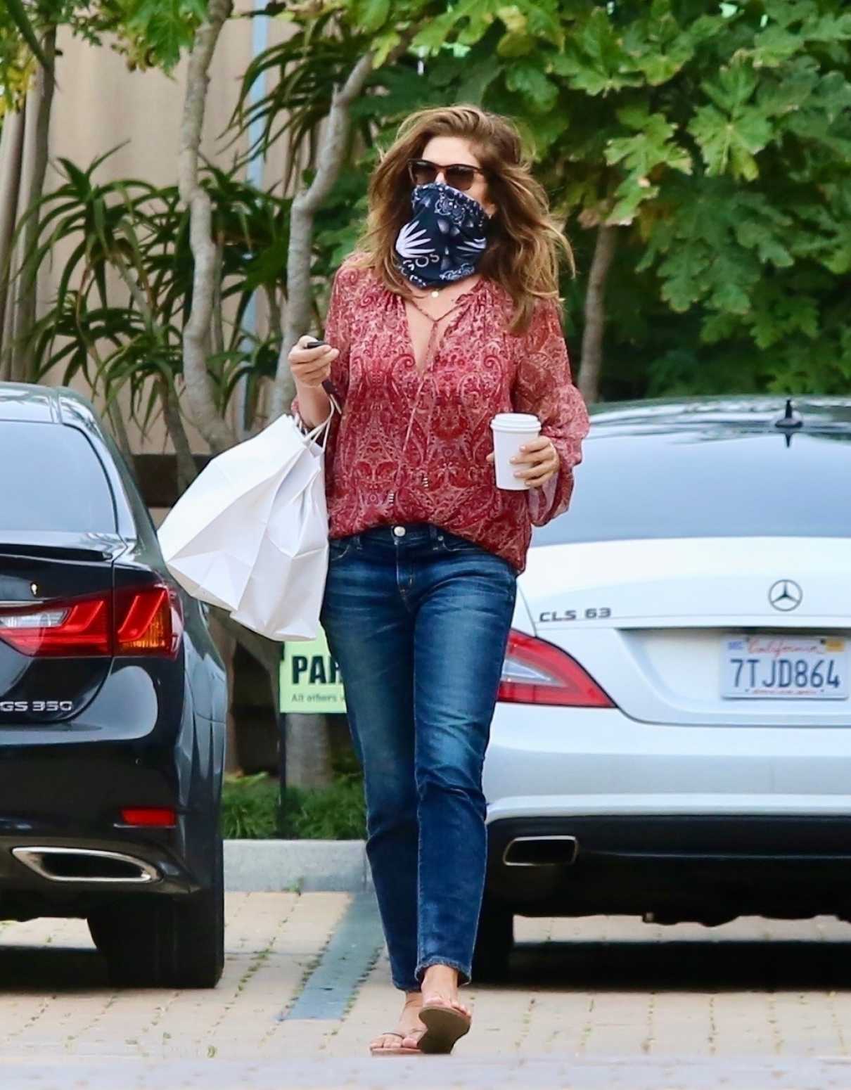 Cindy Crawford in a Bandana as a Face Mask