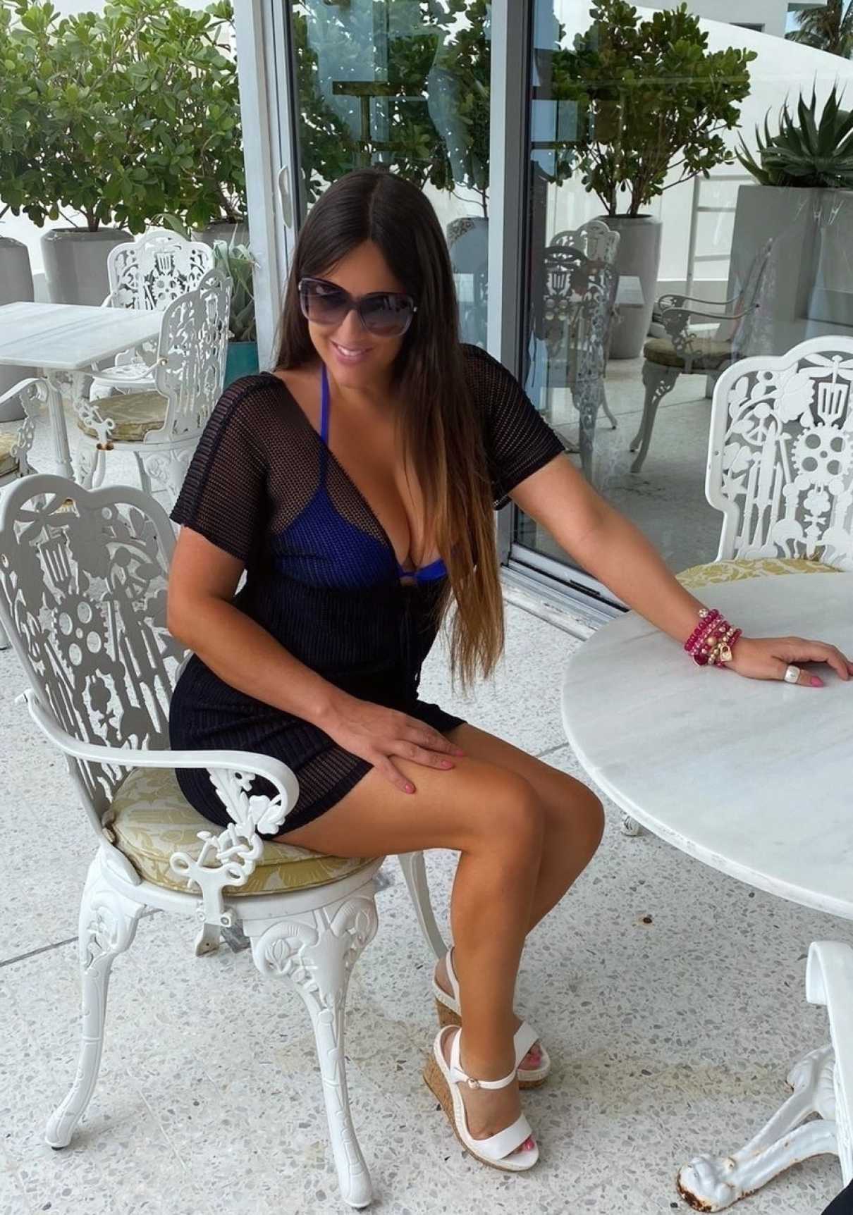Claudia Romani in a Blue Bikini