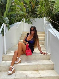 Claudia Romani in a Blue Bikini