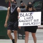 Darren Criss in a Bandana as a Face Mask Attends the Black Lives Matter Protest Out witn His Wife Mia Swier in Hollywood 06/02/2020