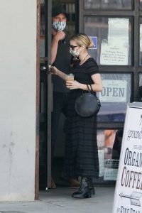 Emma Roberts in a Protective Mask