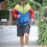 Harry Styles in a Red Sneakers Does a Morning Jog Out in London 06/13/2020