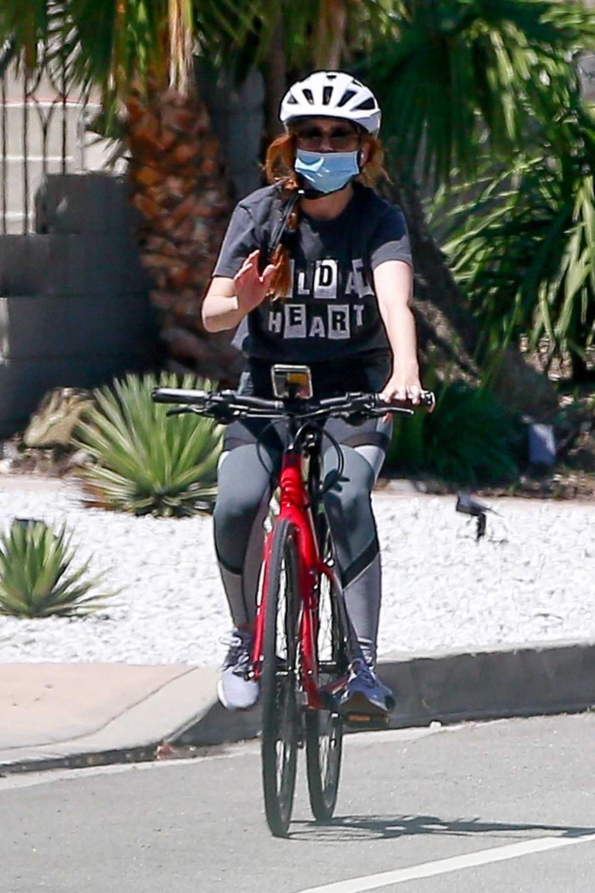 Isla Fisher in a Blue Protective Mask