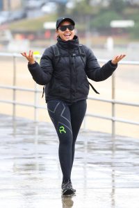 Jessica Mauboy in a Black Cap