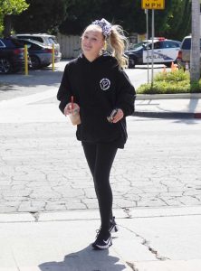 JoJo Siwa in a Black Hoody