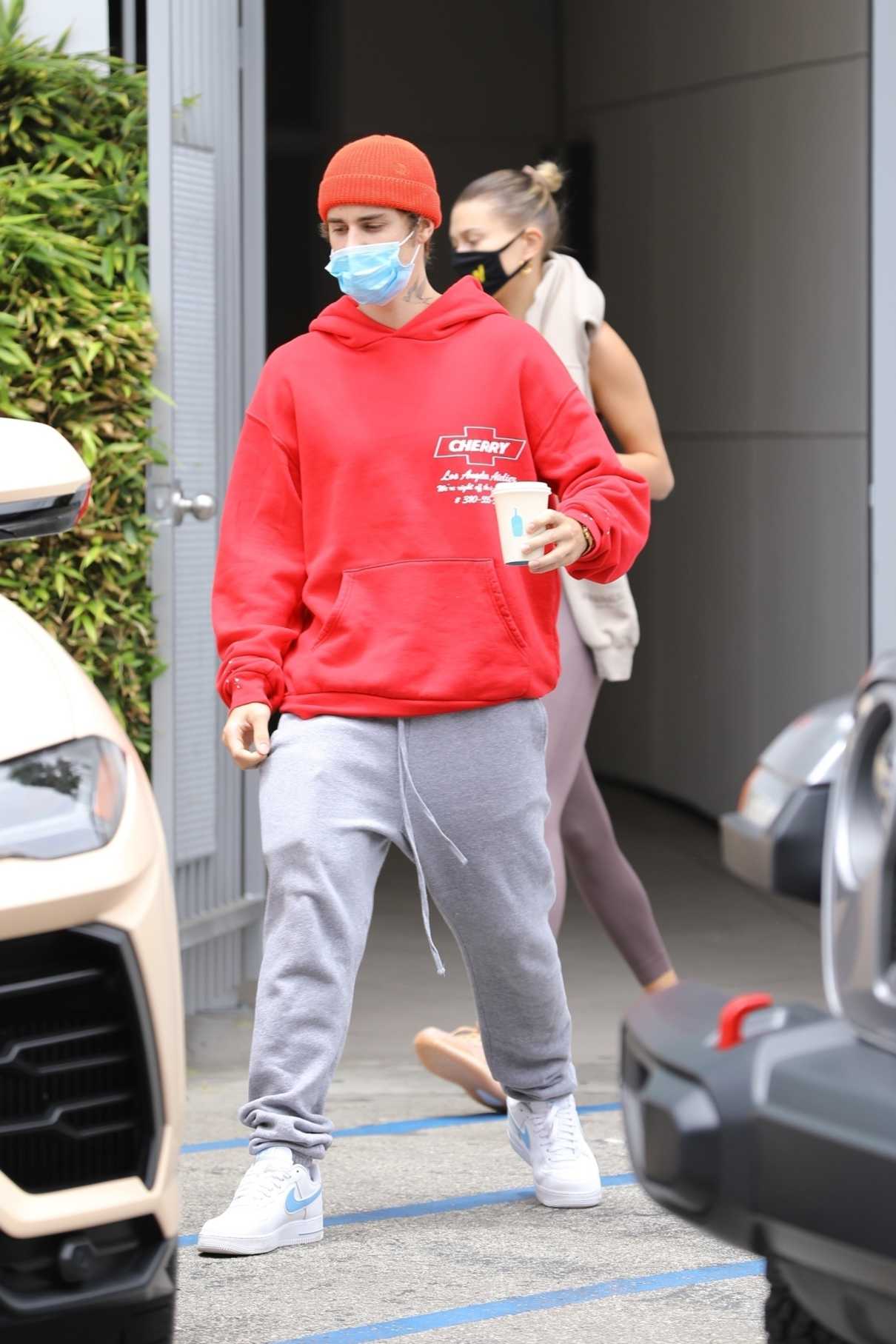 Justin Bieber in a Red Hoody Was Seen Out with Hailey Bieber in Los ...