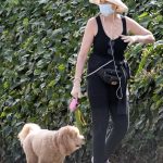 Marcia Cross in a White Hat Walks Her Dog Around the Neighborhood in Los Angeles 06/01/2020