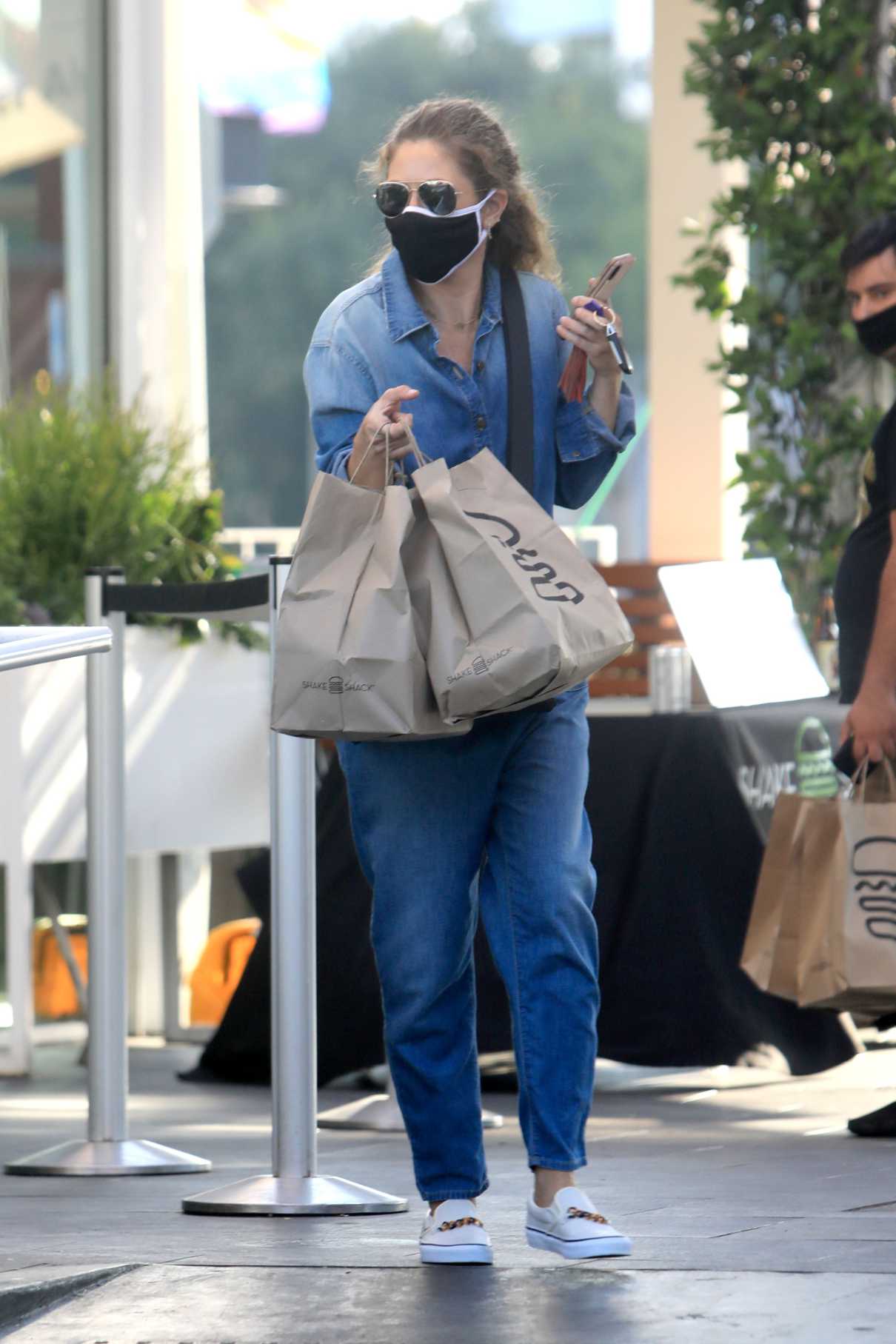 Rebecca Gayheart in a Blue Coverall Picks Up Food to Go at a Shake ...