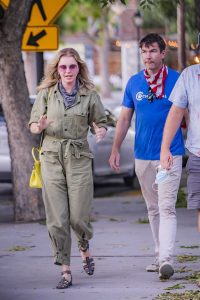 Rebecca Romijn in a Green Coverall