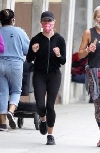 Reese Witherspoon in a Red Checkered Mask