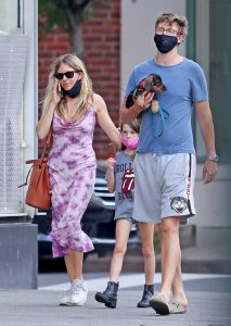 Sienna Miller in a Purple Dress