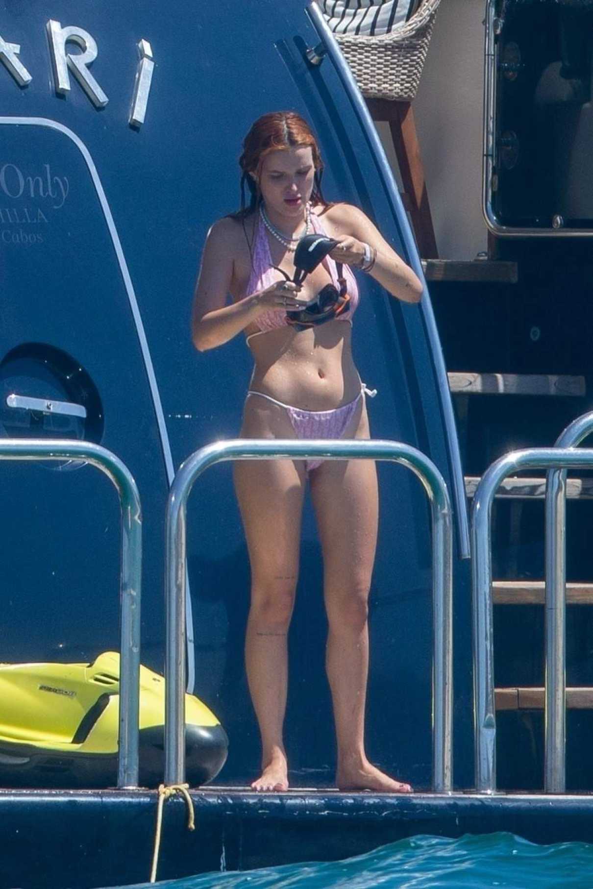 Bella Thorne in a Purple Bikini