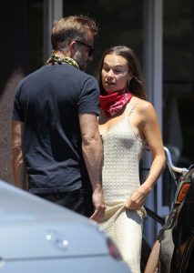 Blanda Eggenschwiler in a Beige Dress