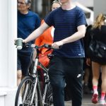 Eddie Redmayne in a Striped Tee Pushes His Bike on the King’s Road in London 07/07/2020