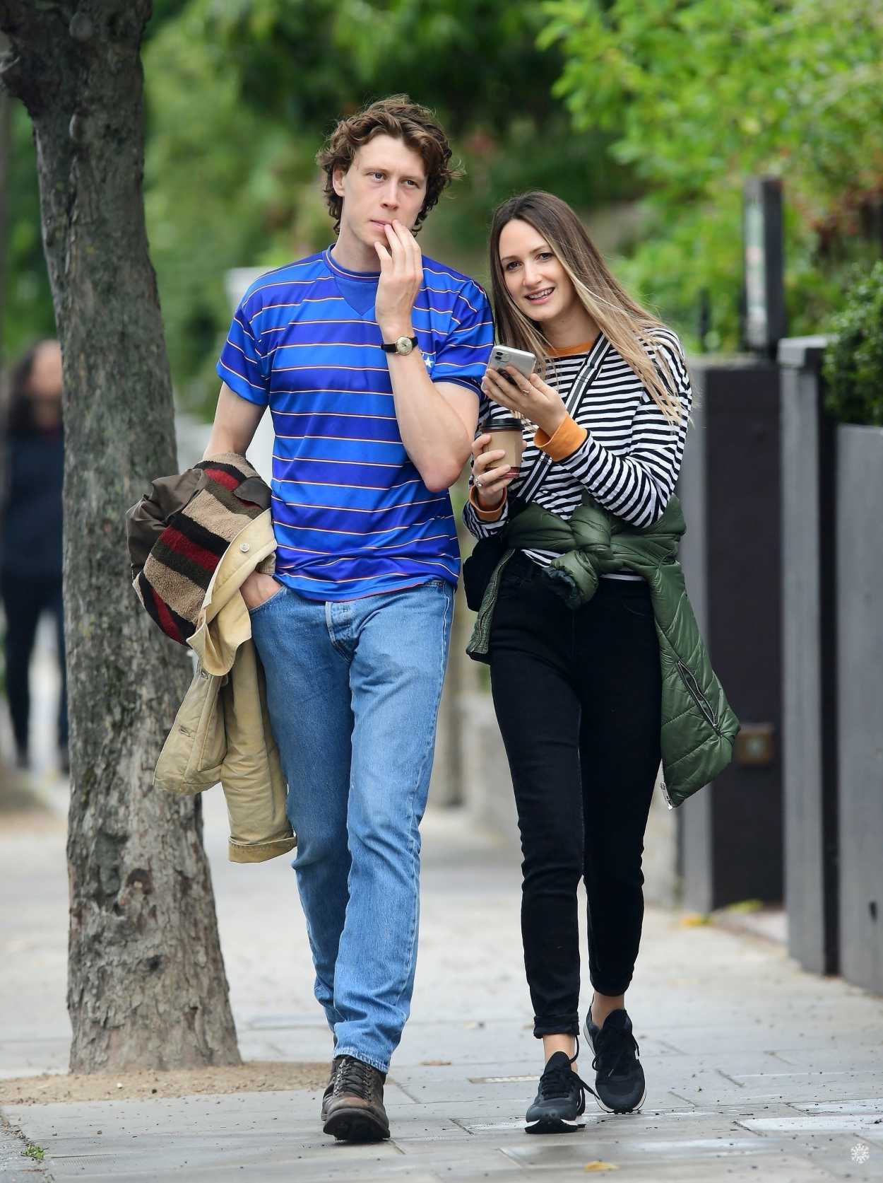 George MacKay in a Blue Striped T-Shirt Was Seen Out with His Girlfriend in...