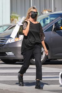 Heidi Klum in a Black Protective Mask