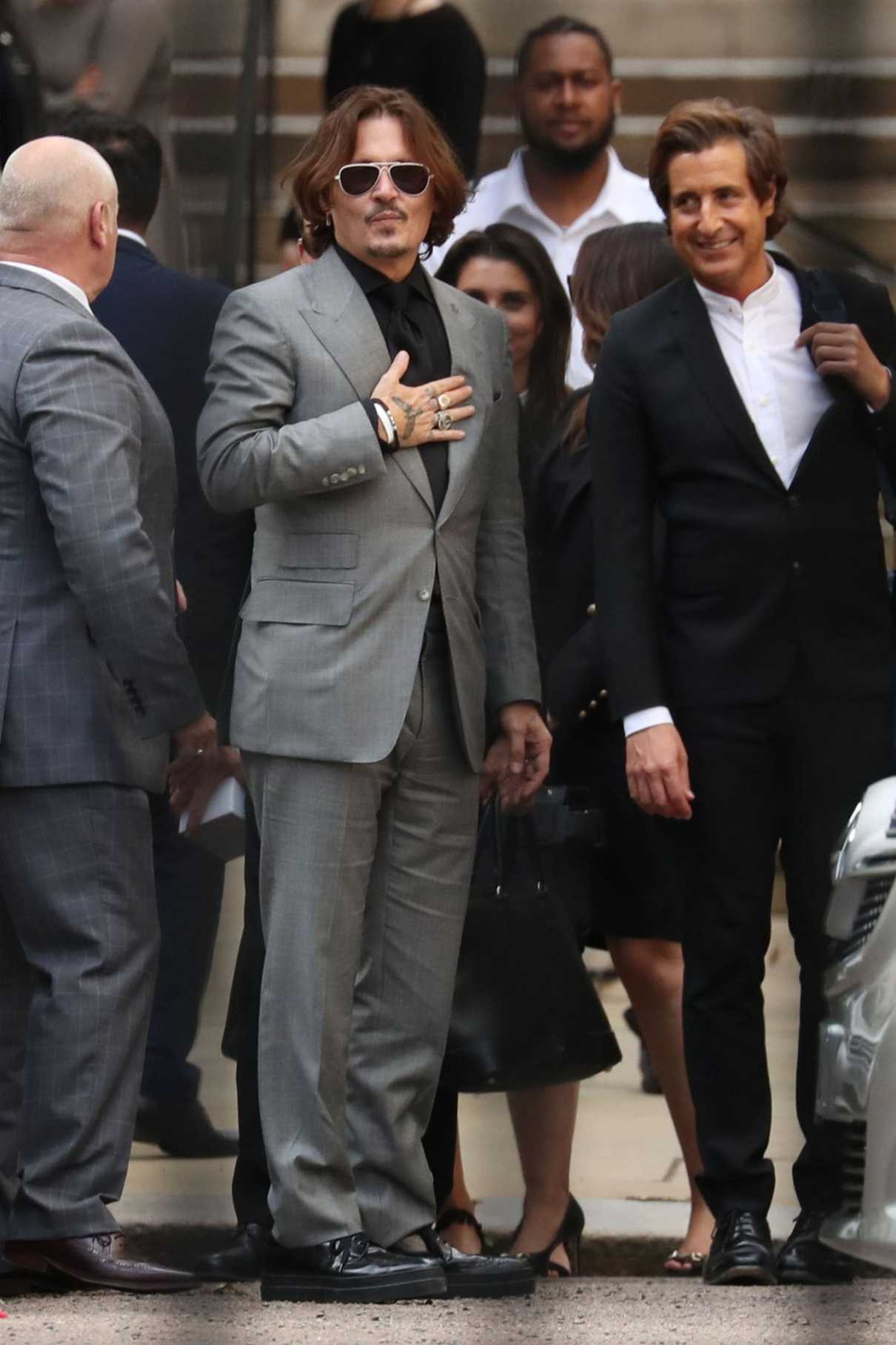 Johnny Depp in a Gray Suit Leaves the Royal Courts of Justice in London ...