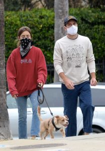 Lily Collins in a Red Sweatshirt