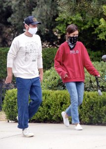 Lily Collins in a Red Sweatshirt