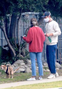 Lily Collins in a Red Sweatshirt