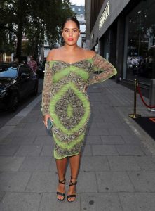 Malin Andersson in a Green Snakeskin Print Dress