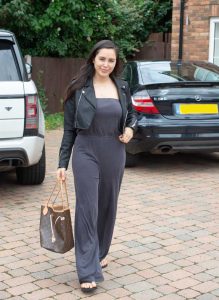 Marnie Simpson in a Black Leather Jacket