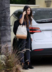 Megan Fox in a Black Ripped Jeans