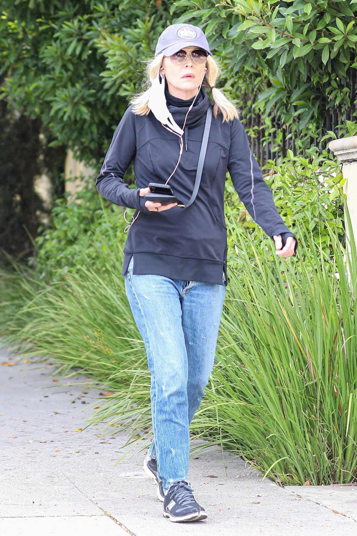 Michelle Pfeiffer in a Blue Ripped Jeans