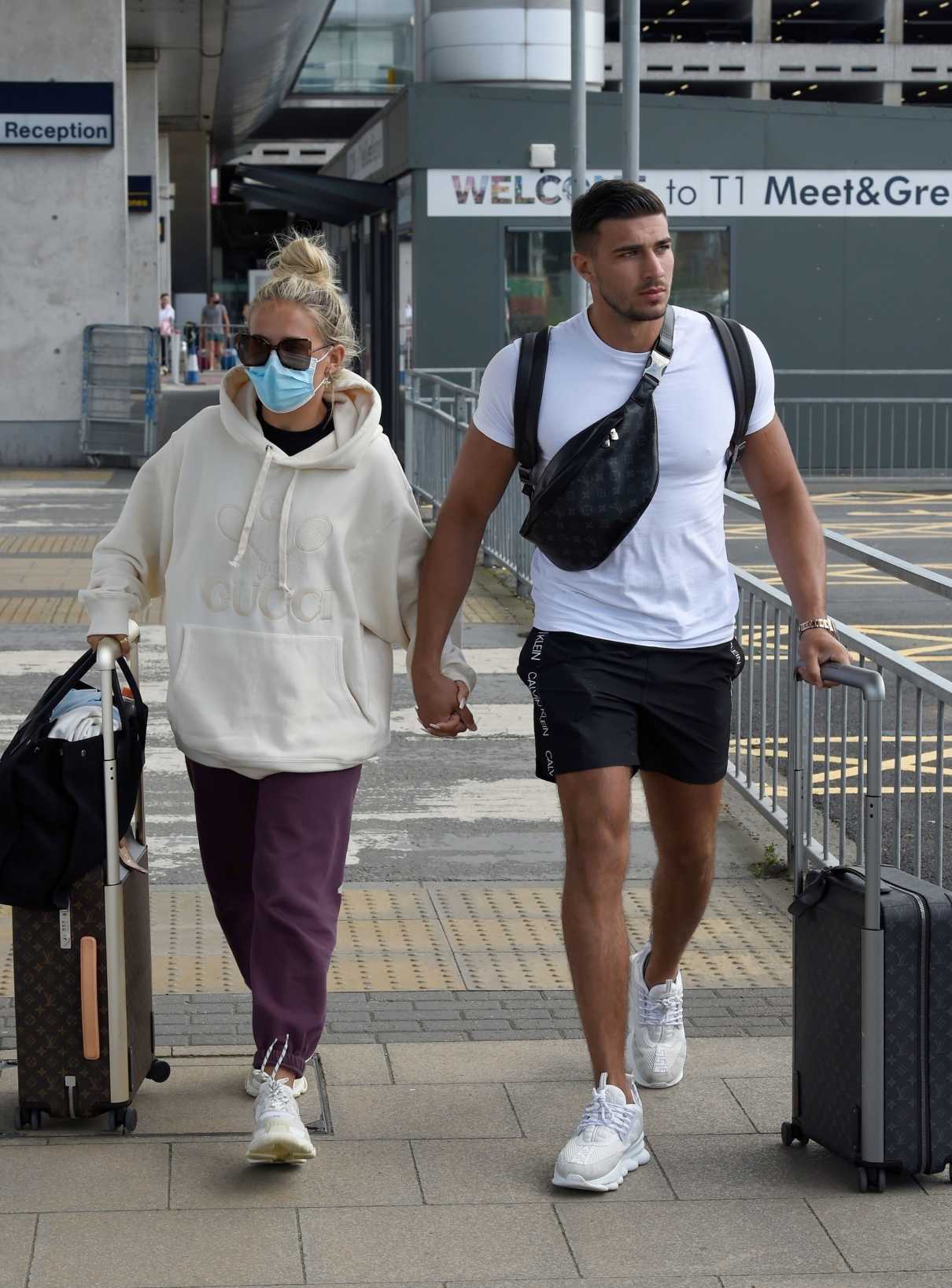 Molly-Mae Hague in a Protective Mask Arrives at Airport in Manchester  07/20/2020 –