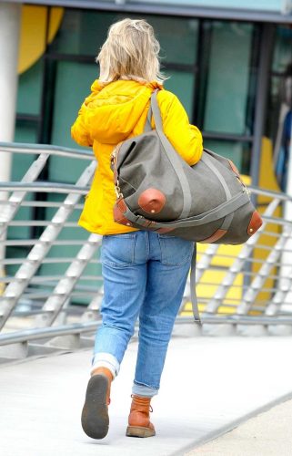 Sally Carman in a Yellow Track Jacket Leaves the Corrie Studios in