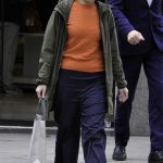 Sally Carman in an Orange Tee Goes Shopping in Manchester 06/30/2020