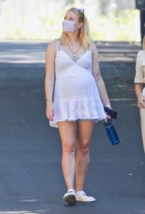 Sophie Turner in a White Dress