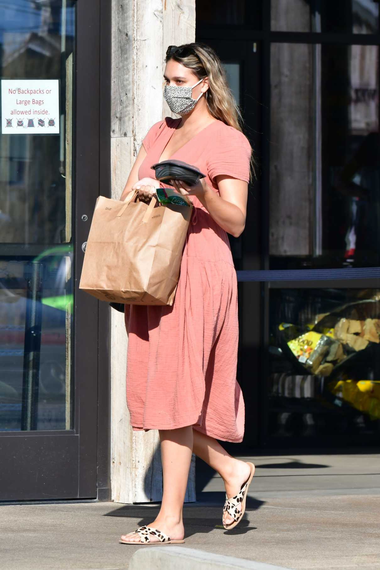 April Love Geary in a Pink Dress
